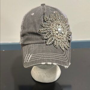 Embellished Gray Cap with Crystal Flower from The BUCKLE.